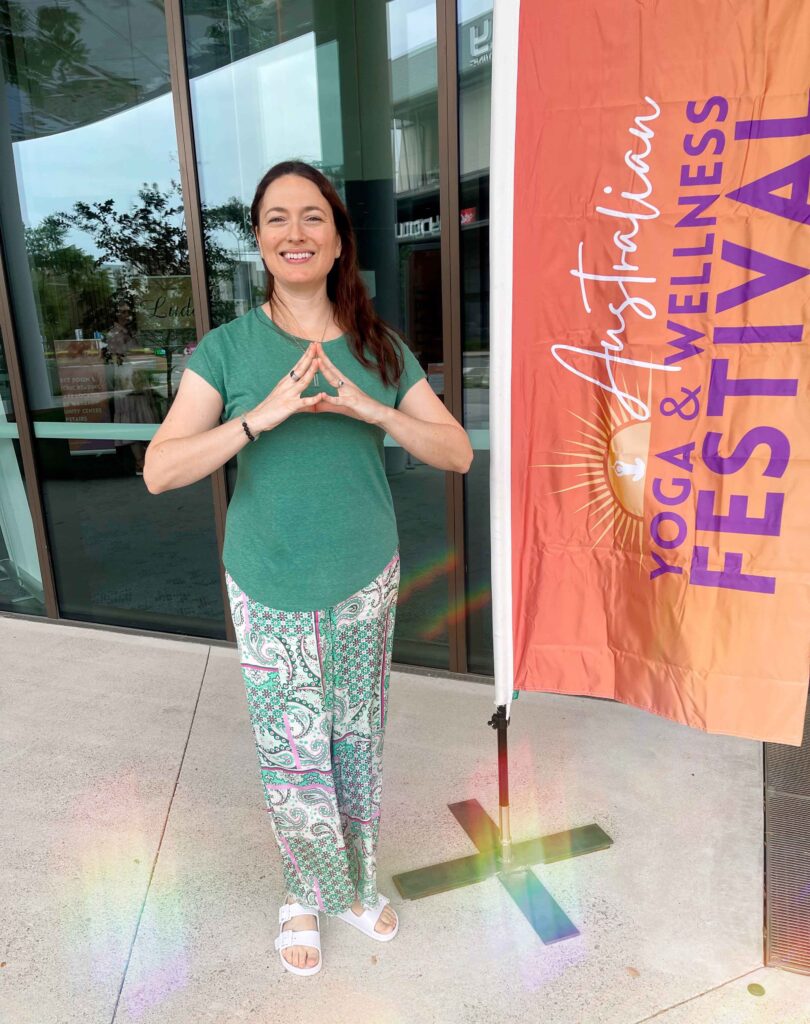 Emma doing Hakini mudra out the front of the Western Sydney Conference Centre